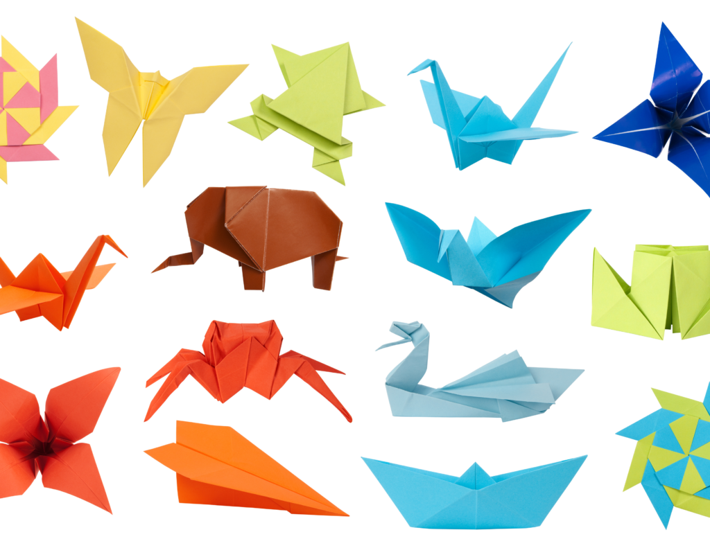 Multiple shapes and colors of paper folded into origami objects. An elephant, a duck, a plane, a butterfly and more