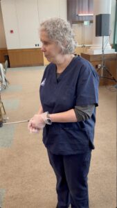 Christine demonstrates how to properly remove gloves without getting the contamination on your hands.